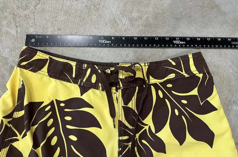 Y2K vintage Quiksilver Men's yellow Hawaiian Boardriding Floral Board Shorts 32”